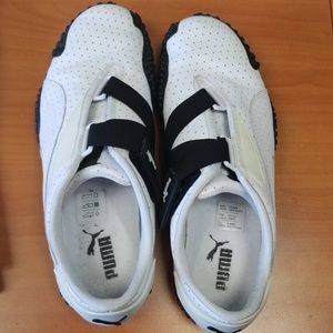 White and black puma shoes